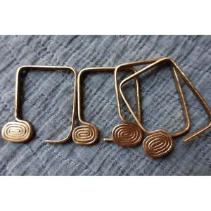 set of 4 Vintage napkin rings metal‎ brass with swirl rectangular design
